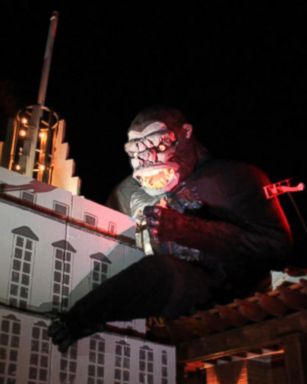 Ammon Smith, 33, of Salt Lake City created a 39-foot Empire State Building with King Kong attached for the holiday. 