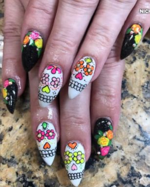 Nichole Herrera, a manicurist at Artistic Nails in Corpus Christi, Texas, has some Halloween masterpieces.