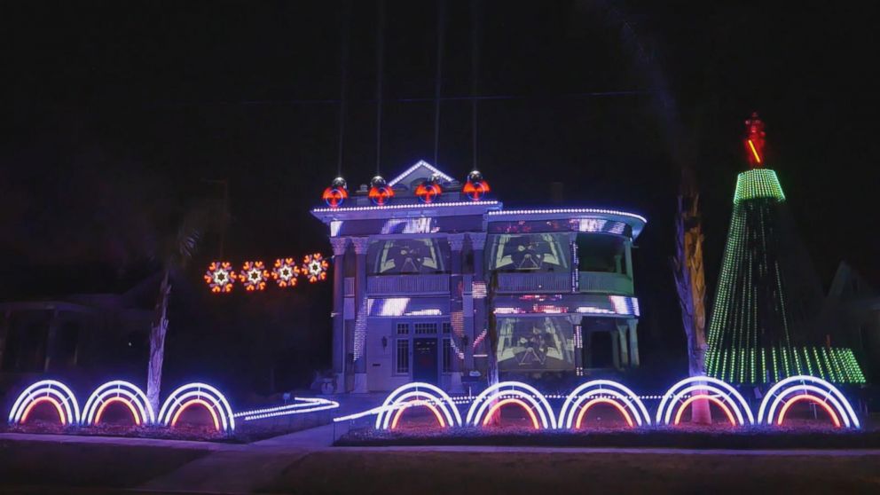 Matt Johnson, the owner of Living Light Shows in San Antonio, Texas, created this epic "Star Wars"-themed holiday light show on a house by a park downtown.