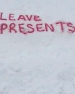 VIDEO: Jennifer Murphy, 9, wrote her plea in the snow for Saint Nick to see.