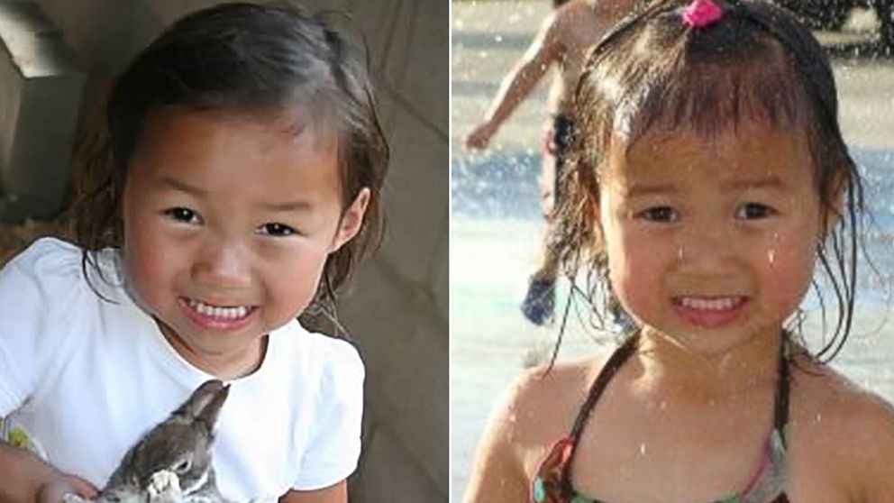 PHOTO: The two share a similar smile. Audrey Doering, pictured left at age 4, holds a bunny, and Gracie Rainsberry, pictured right at age 3, plays in a fountain.