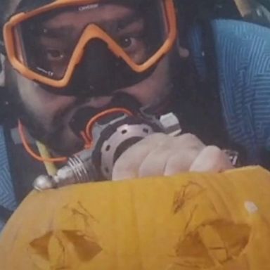 VIDEO: Divers carve Halloween jack-o'-lanterns in underwater pumpkin carving contest