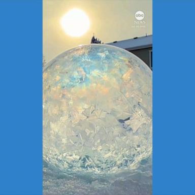 VIDEO: Soap bubbles freeze over during icy weather