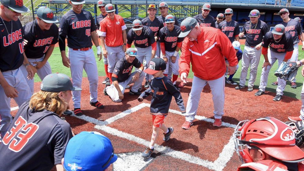 PHOTO: Lio Ortega, a 4-year-old cancer patient, runs the bases during a recent college baseball game in El Paso County, Colo.