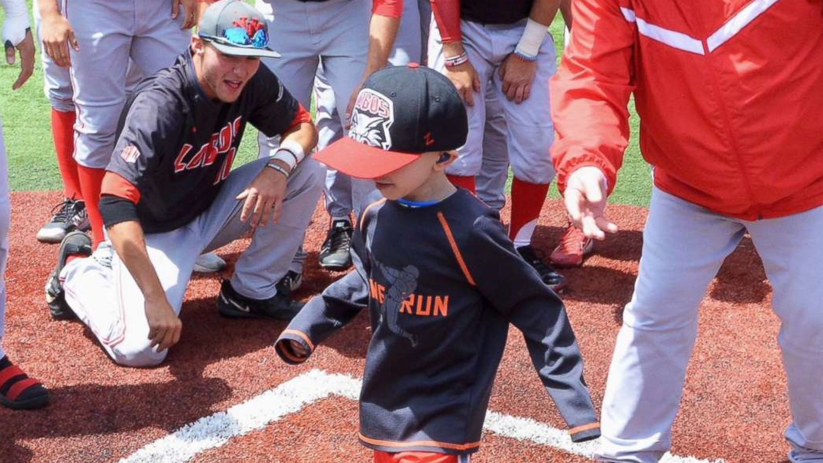 PHOTO: Lio Ortega, a 4-year-old cancer patient, runs the bases during a recent college baseball game in El Paso County, Colo.