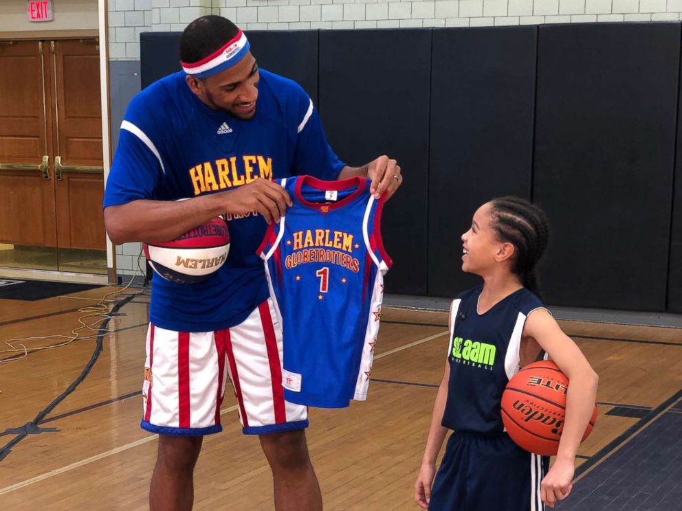 PHOTO: Karis also gained the attention of the Harlem Globetrotters, one of whom surprised her on the court today with her own personal jersey.