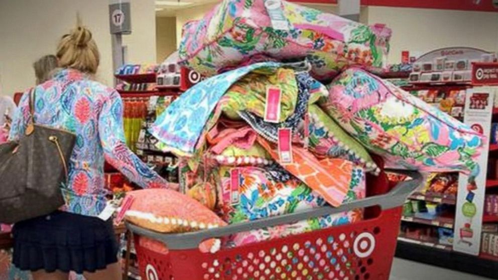 A woman shops for Lilly Pulitzer items at Target.