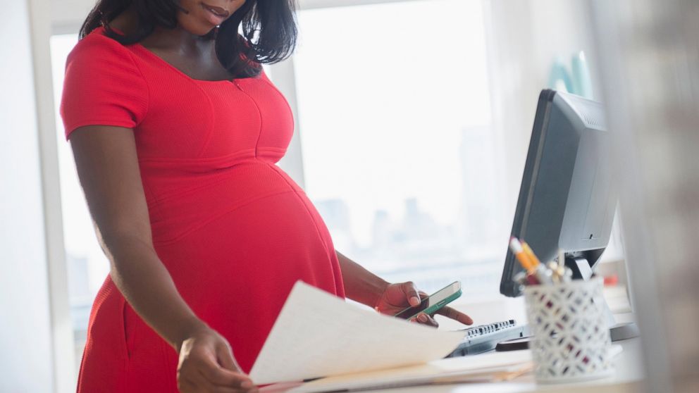 PHOTO: A pregnant woman sits at her computer in this undated file photo. 