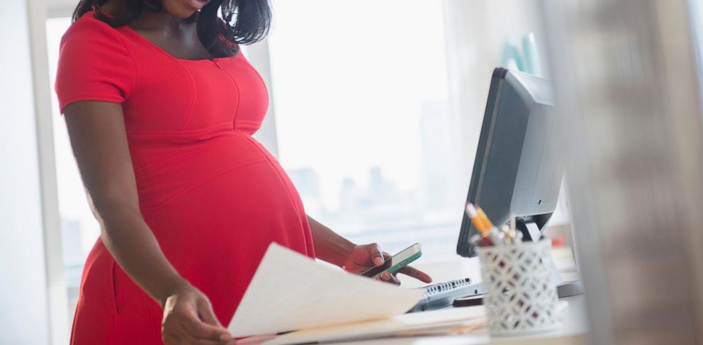 PHOTO: A pregnant woman sits at her computer in this undated file photo. 