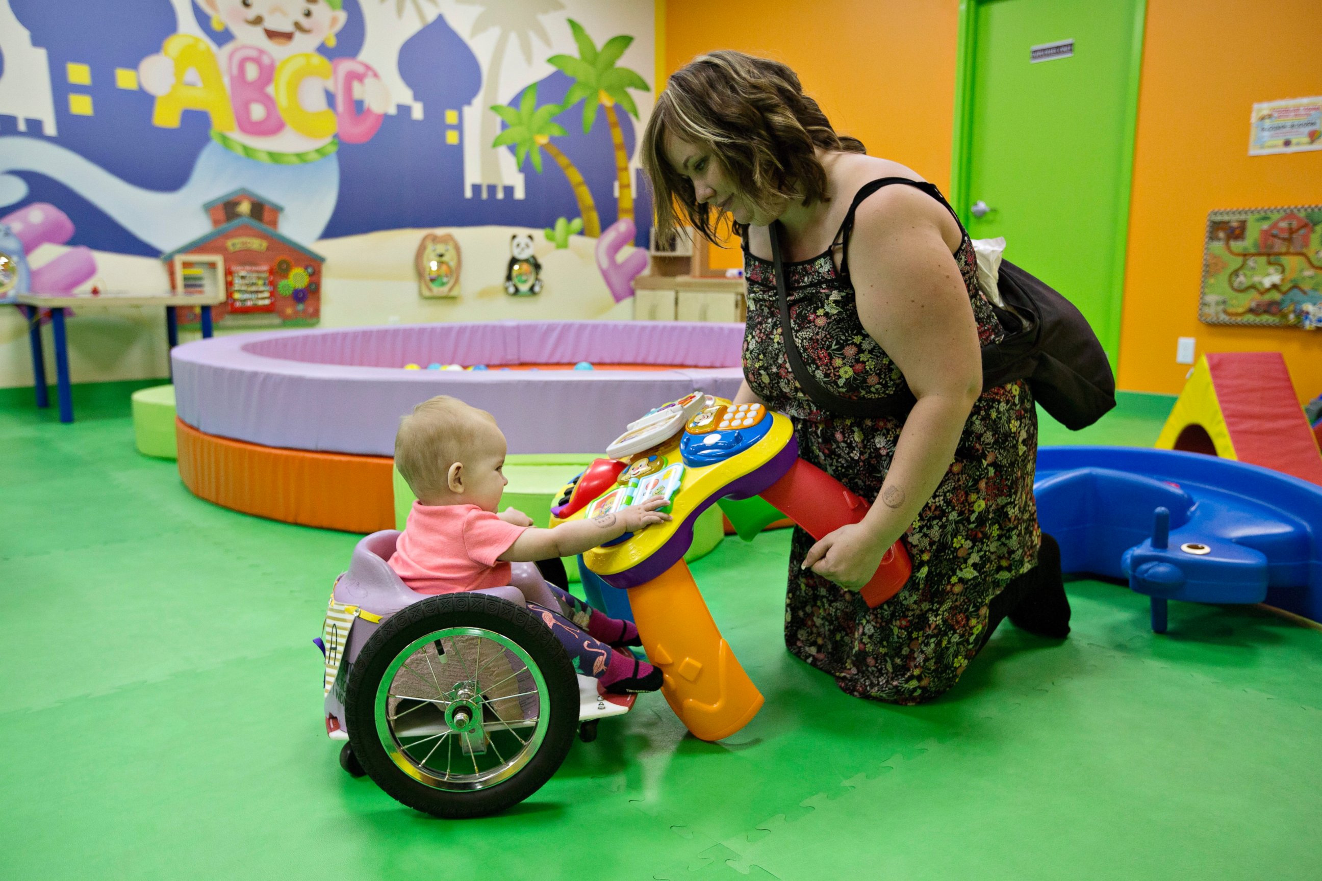PHOTO: Kim Moore and her one-year-old daughter Evelyn Moore play at an indoor play ground in Edmonton Alberta, Canada, Aug. 9, 2016. Evelyn, also called Eva by her family, was diagnosed with cancer following her four-month check up.