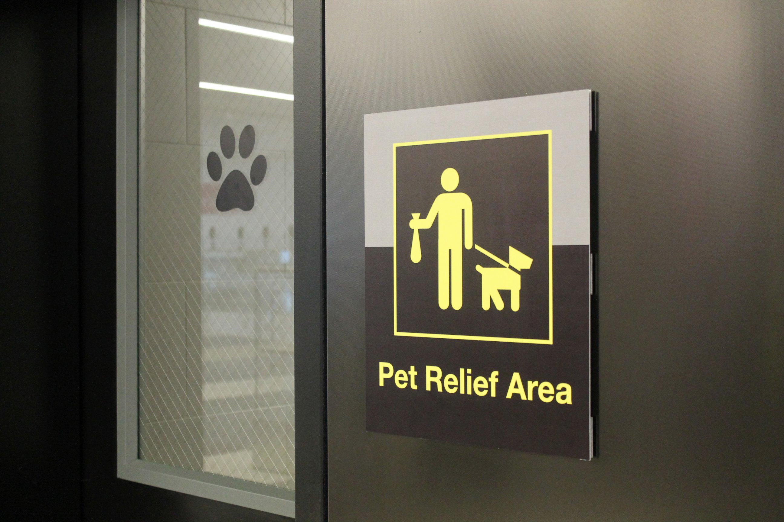 PHOTO: This April 26, 2016 photo shows sign marking the new pet relief area, which opened on April 4, at JFK International Airport Terminal 4 in New York.  