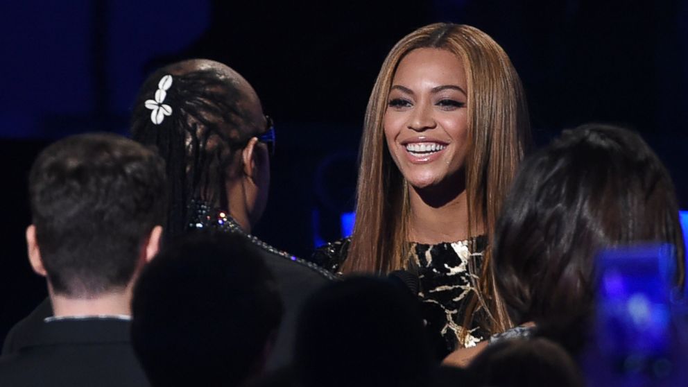 PHOTO: Beyonce, right, greets Stevie Wonder in the audience before her performance at "Stevie Wonder: Songs in the Key of Life - An All-Star Grammy Salute," Feb. 10, 2015, in Los Angeles. 