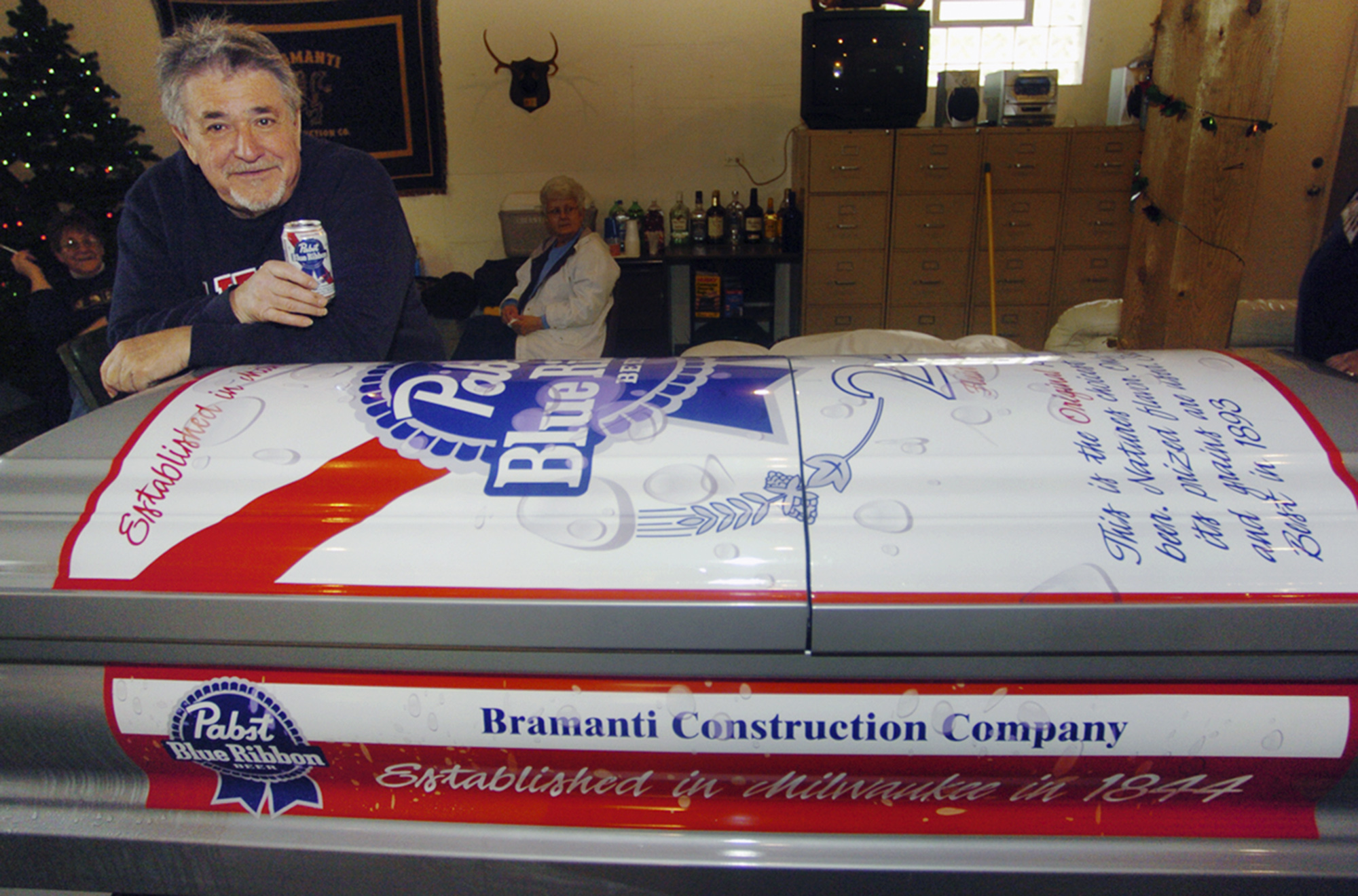 PHOTO: In this file photo, Bill Bramanti poses with a coffin he had specially designed to look like a can of his favorite beer, Pabst Blue Ribbon, in Chicago Heights, Ill on May 3, 2008.