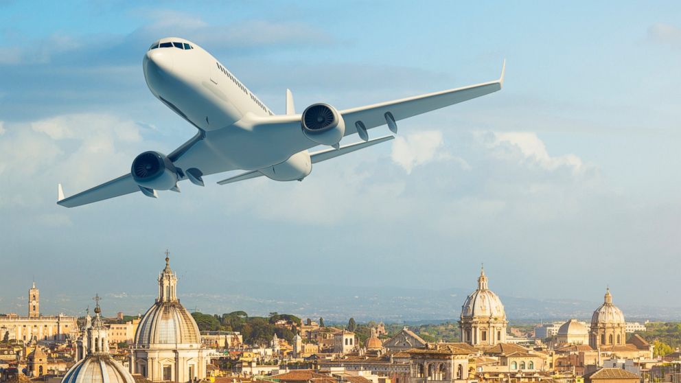 An airlpane flies over Rome in this undated stock photo.