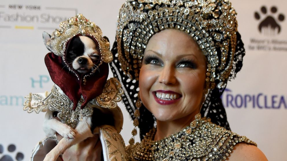 Summer Strand and her dog April Moon pose during the 14th Annual New York Pet Fashion Show, Feb. 9, 2017.