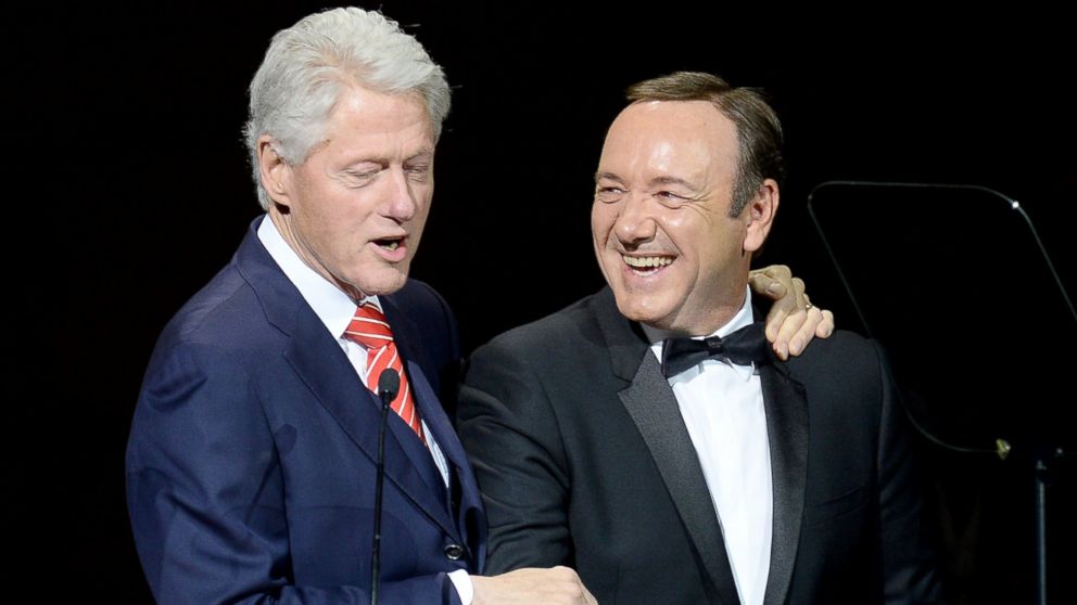 Former President Bill Clinton and Kevin Spacey speak during the 25th Anniversary Rainforest Fund Benefit Concert at Carnegie Hall, April 17, 2014, in New York City.