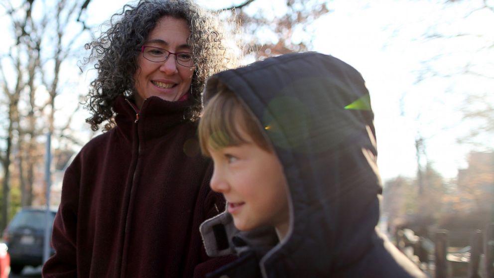 Danielle Meitiv waits with her son Rafi Meitiv, Jan. 16, 2015.