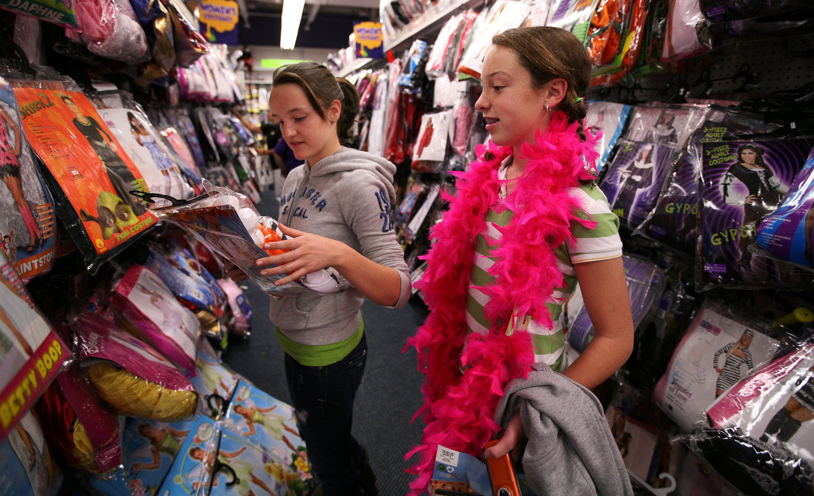 PHOTO: Maggie Ryan, 13, left, and Meredith Sullivan, 13, right, shop for Halloween costumes in this file photo. 