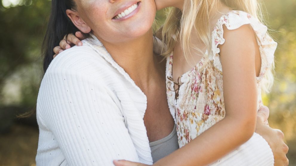 A mother and daughter are pictured in this stock image. 