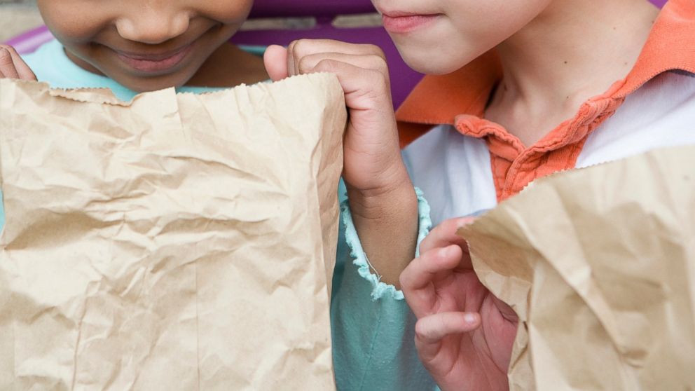 PHOTO: Students are pictured looking in their lunch bags in this stock image.