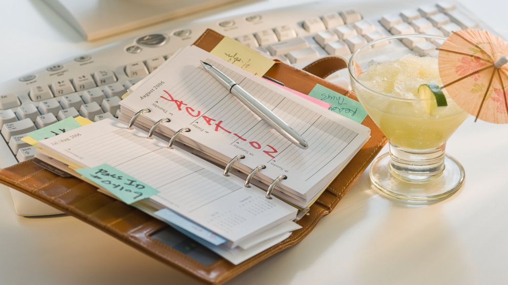 A planner and a drink are seen here in this undated file photo.