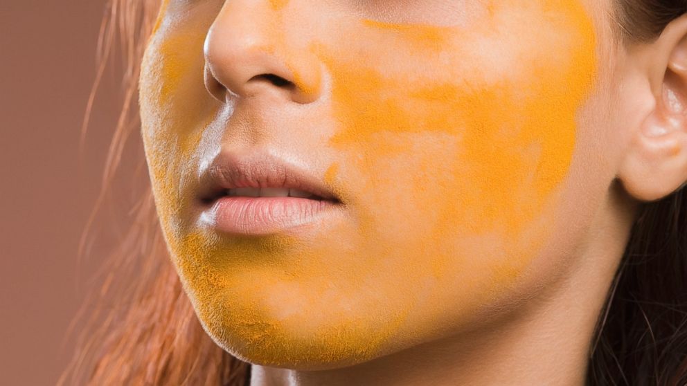 PHOTO: A woman is seen here with turmeric on her face in an undated stock file photo.