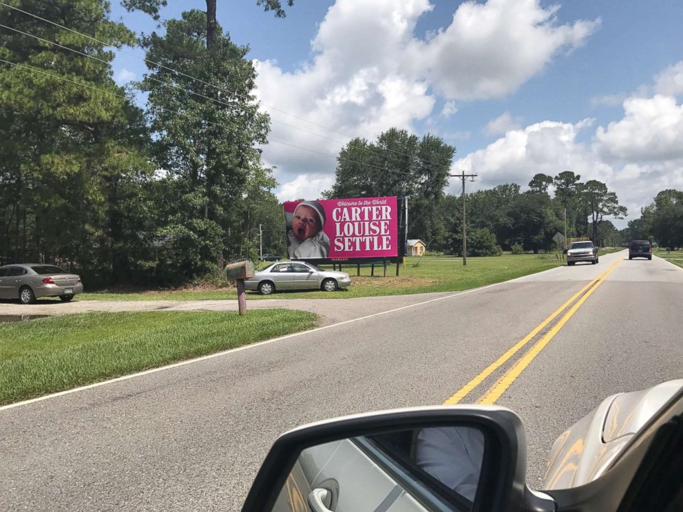 PHOTO: Kelen and Will Settle were surprised when his coworkers put up a giant billboard announcing their daughter's birth along a South Carolina highway.