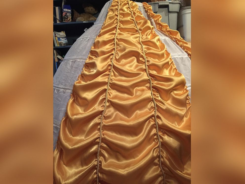 PHOTO: Joel Lynch pulled off a magical Beauty and the Beast proposal for Cara Szymanski complete with Belles yellow gown.