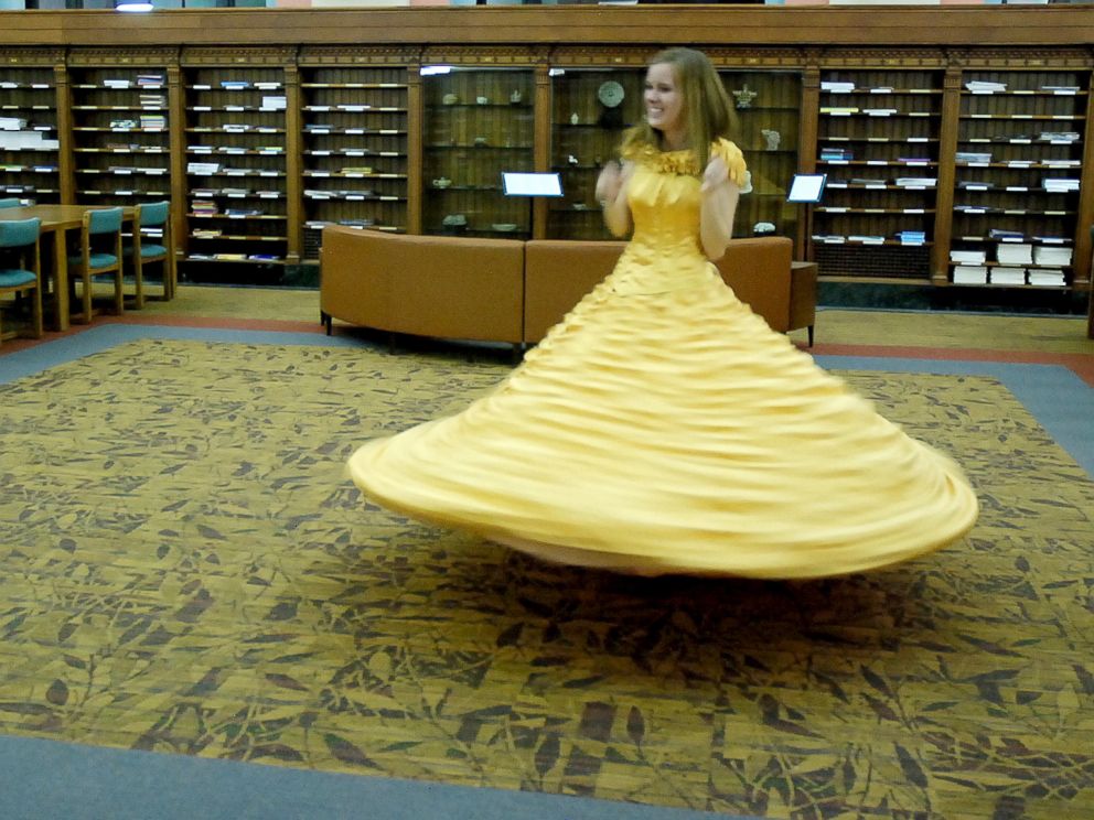 PHOTO: Joel Lynch pulled off a magical Beauty and the Beast proposal for Cara Szymanski complete with Belles yellow gown.
