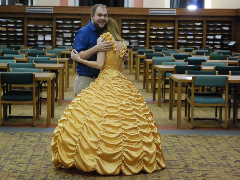 PHOTO: Joel Lynch pulled off a magical Beauty and the Beast proposal for Cara Szymanski complete with Belles yellow gown.