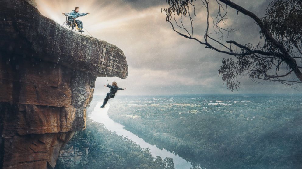 PHOTO: Photographer Benjamin Von Wong captured paralyzed mother Sarah Jane Staszak dangling off a cliff in Australia with her son, Hamish. 