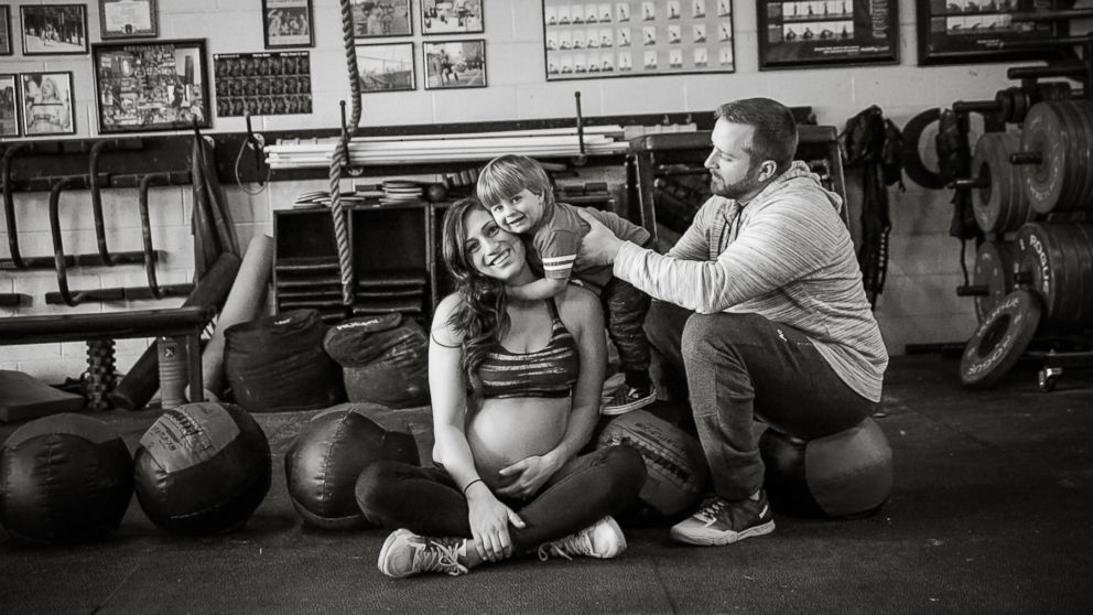Lauren Ferris poses with son, Connor, and husband, Garrett, during her CrossFit maternity shoot.