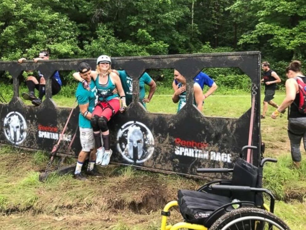 PHOTO: Tiffany Gambill, 27, who has Friedreich's ataxia, recently completed a Spartan Race in Rutland, Mass., with the help of teammates from her local CrossFit gym.