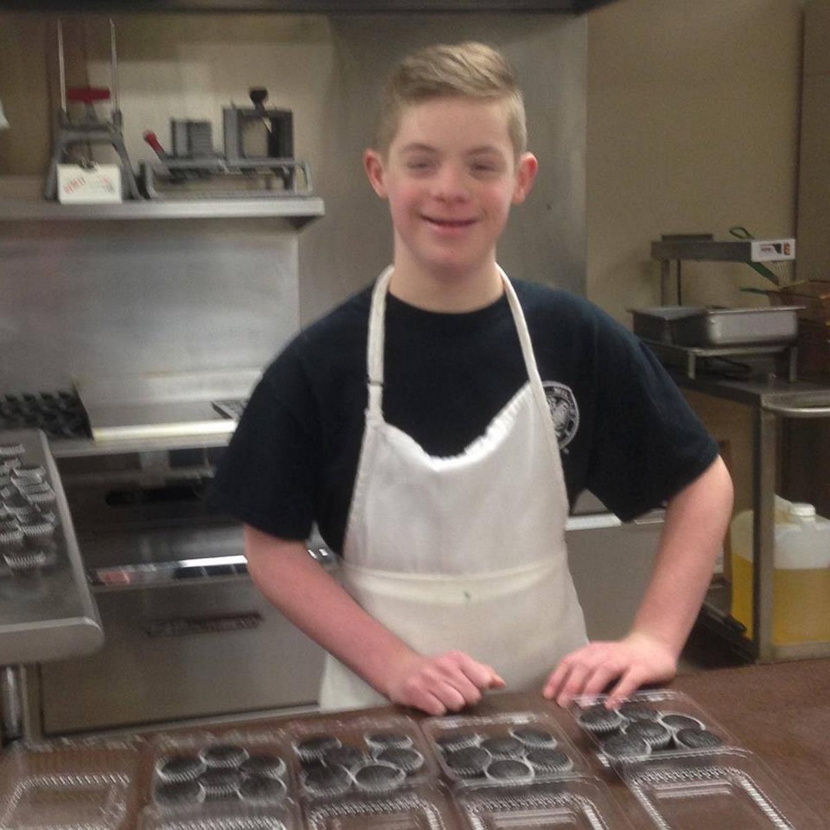 PHOTO: Patricia Truel's 12-year-old son John, who has Down syndrome, helps her run their small cupcake shop in Wisconsin. 