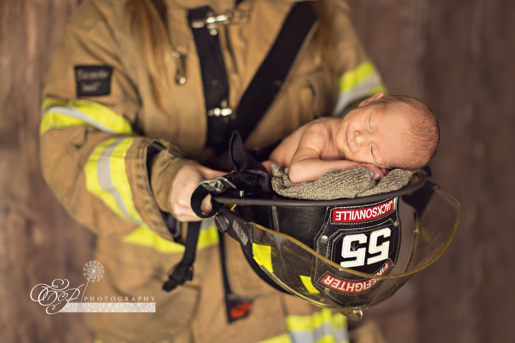 PHOTO: Enzo Anthony Crnolic, 1 month, posed for a newborn photo shoot with his mom's firefighter hat and his dad's police cap. 