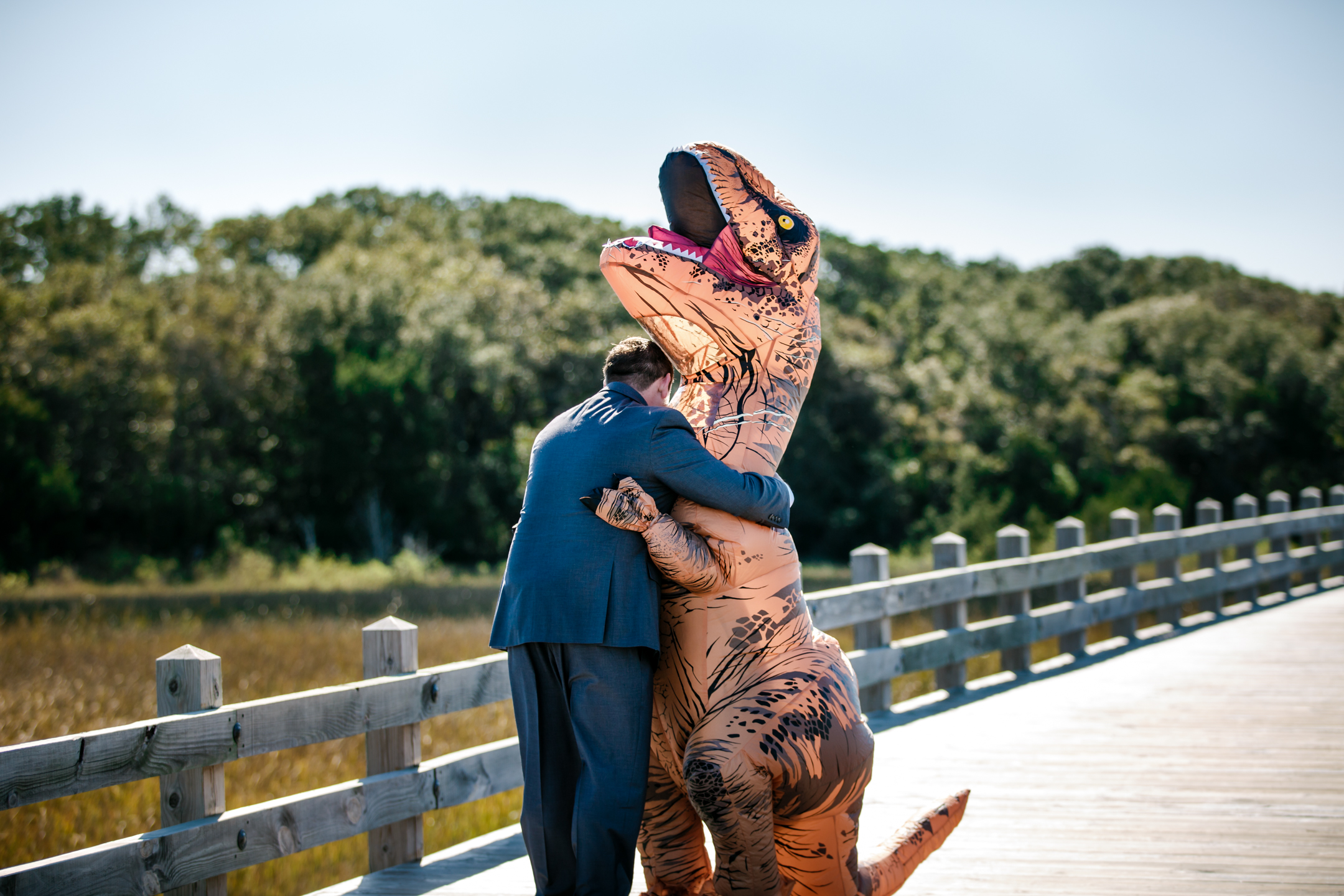 PHOTO: Bride surprises groom in T-Rex costume at the first look before their Nov. 5, 2016 wedding.
