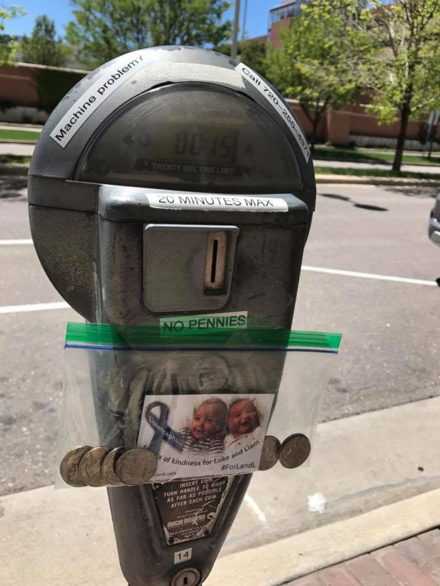 PHOTO: Liz Kawulok participates in the movement by leaving change at parking meters and placing scratch-off tickets and Starbucks gift cards on windshields of cars parked the parking lot of the hospital where Luke and Liam were cared for.