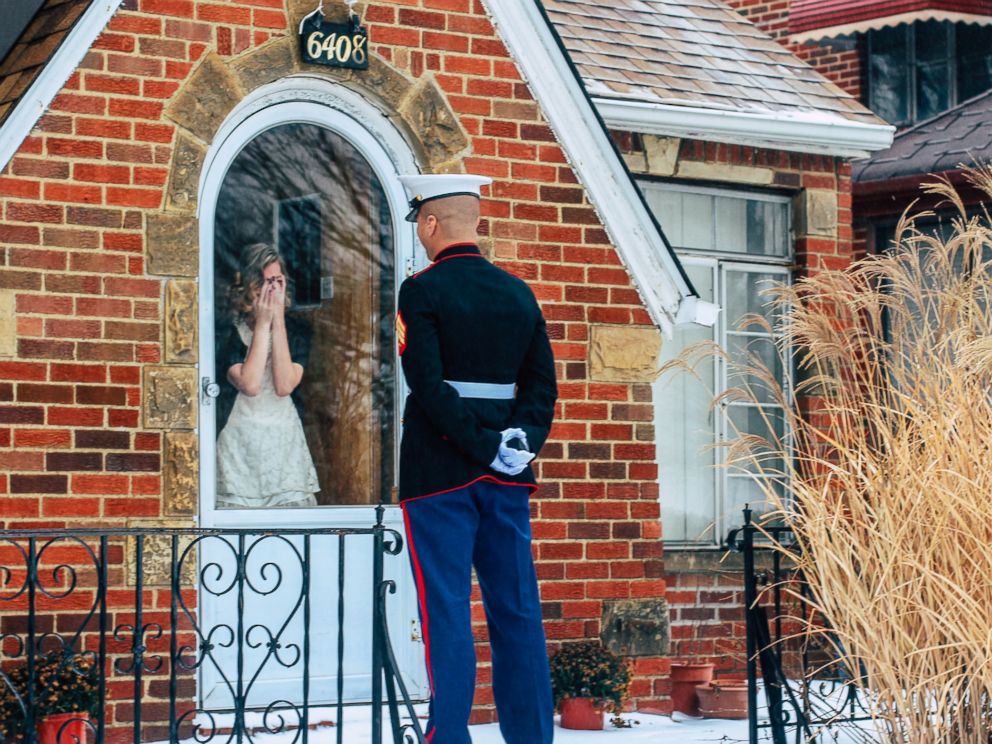 PHOTO: Jon Trommer, a Marine, surprised his girlfriend by popping the question on her snowy doorstep.