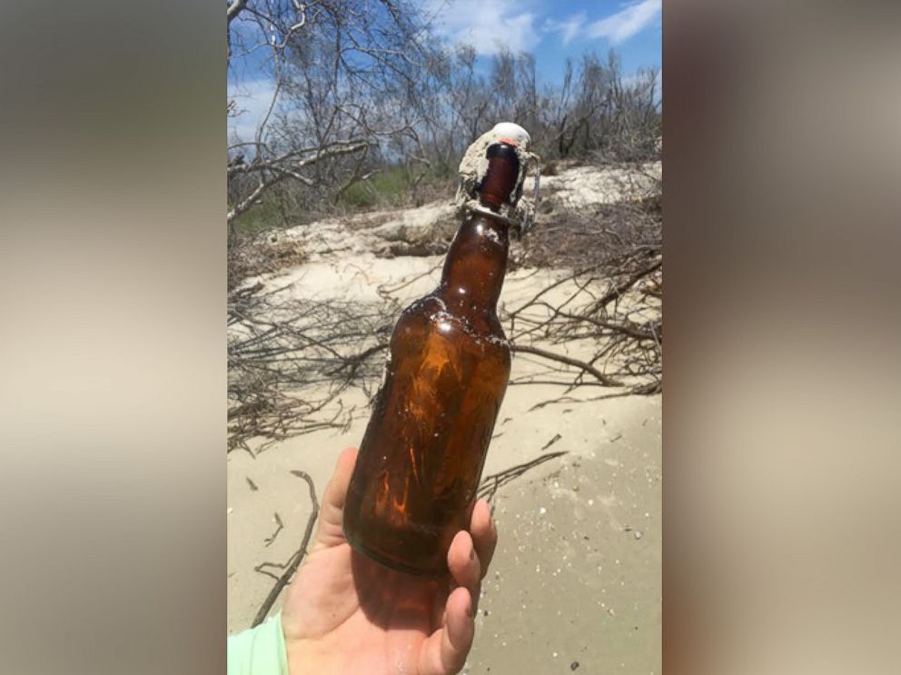 PHOTO: Ryan Burchett found a message in a bottle Doug Stephens sent in 1981 from Fernandina Beach, Florida.hnn b