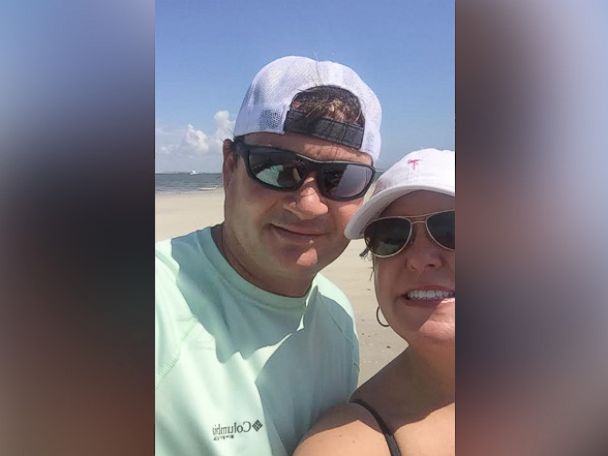 PHOTO: Ryan Burchett posing with his girlfriend on the beach five minutes before discovering the bottle.