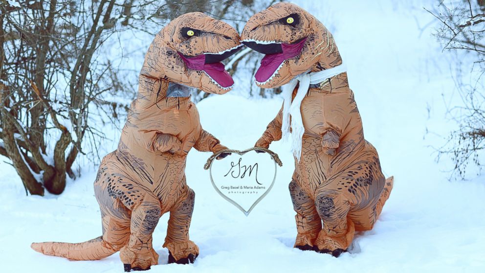 These photographers wanted to prove "love isn't extinct" with their T-Rex engagement photo shoot.