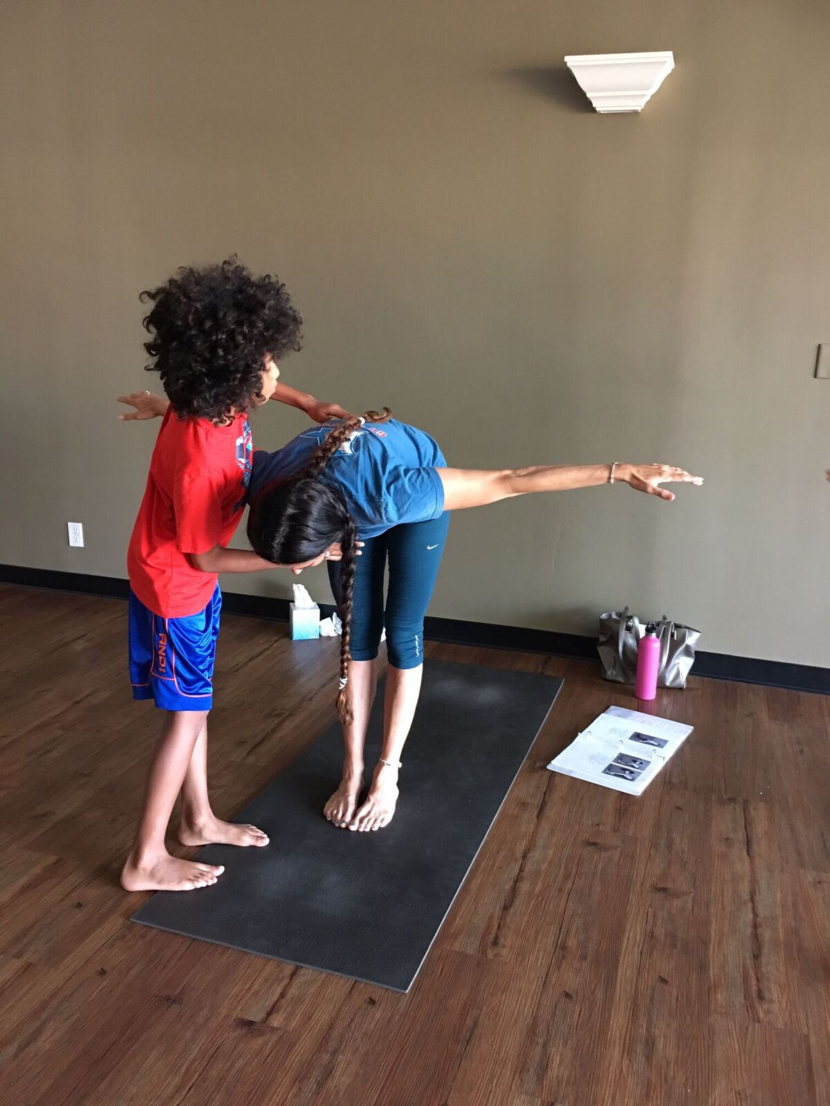 PHOTO: Tabay Atkins, 11, of San Clemente, California, is a yoga instructor at his family's yoga studio.