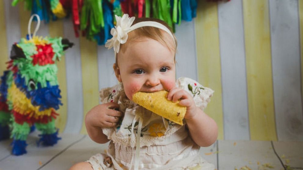 Stella Ogden had a taco smash at her first birthday party. The photos have since gone viral. 