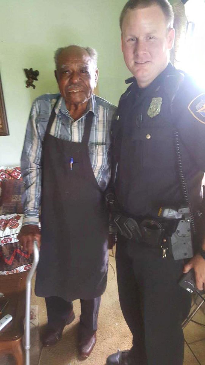 PHOTO: Officer Christopher Weir, 31 and Julius Hatley, 95, are seen here on June 8, 2017, after the Forth Worth Police Department answered a call from Hatley who dialed 9-1-1 when his air conditioning broke inside his home. 