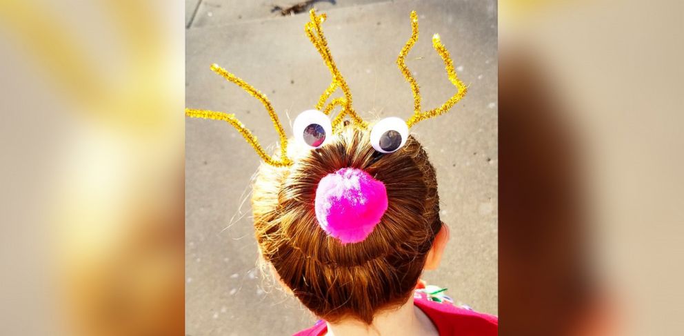 PHOTO: Greg Wickherst styles his daughter Izzy's hair for Christmas. This is the Rudolph bun. 