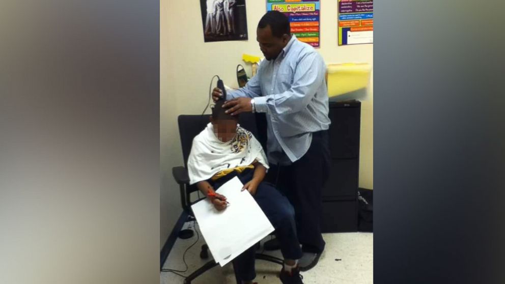 Memphis barber Fidell Woods gives free haircuts every Wednesday to male students at Dr. William Herbert Brewster Elementary School.