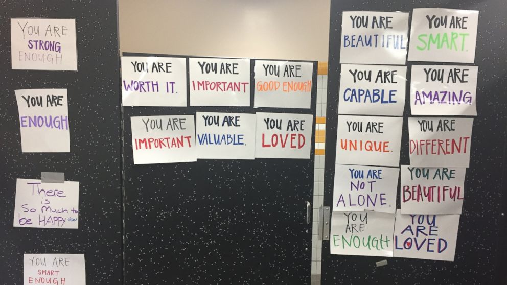 PHOTO: One California high school posted bathroom doors with signs of affirmation. 