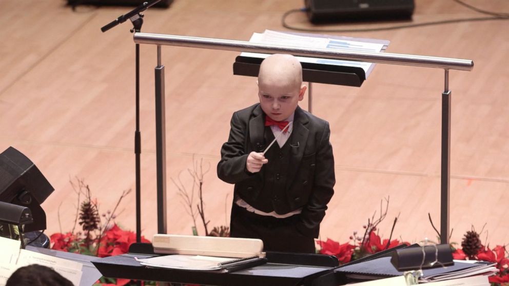 PHOTO: Jordan Cartwright, a 7-year-old boy battling leukemia, fulfilled his dream of conducting an orchestra on Dec. 19, 2016, when he got to conduct the Edmonton Symphony Orchestra at the Francis Winspear Center for Music in Edmonton, Alberta, Canada. 