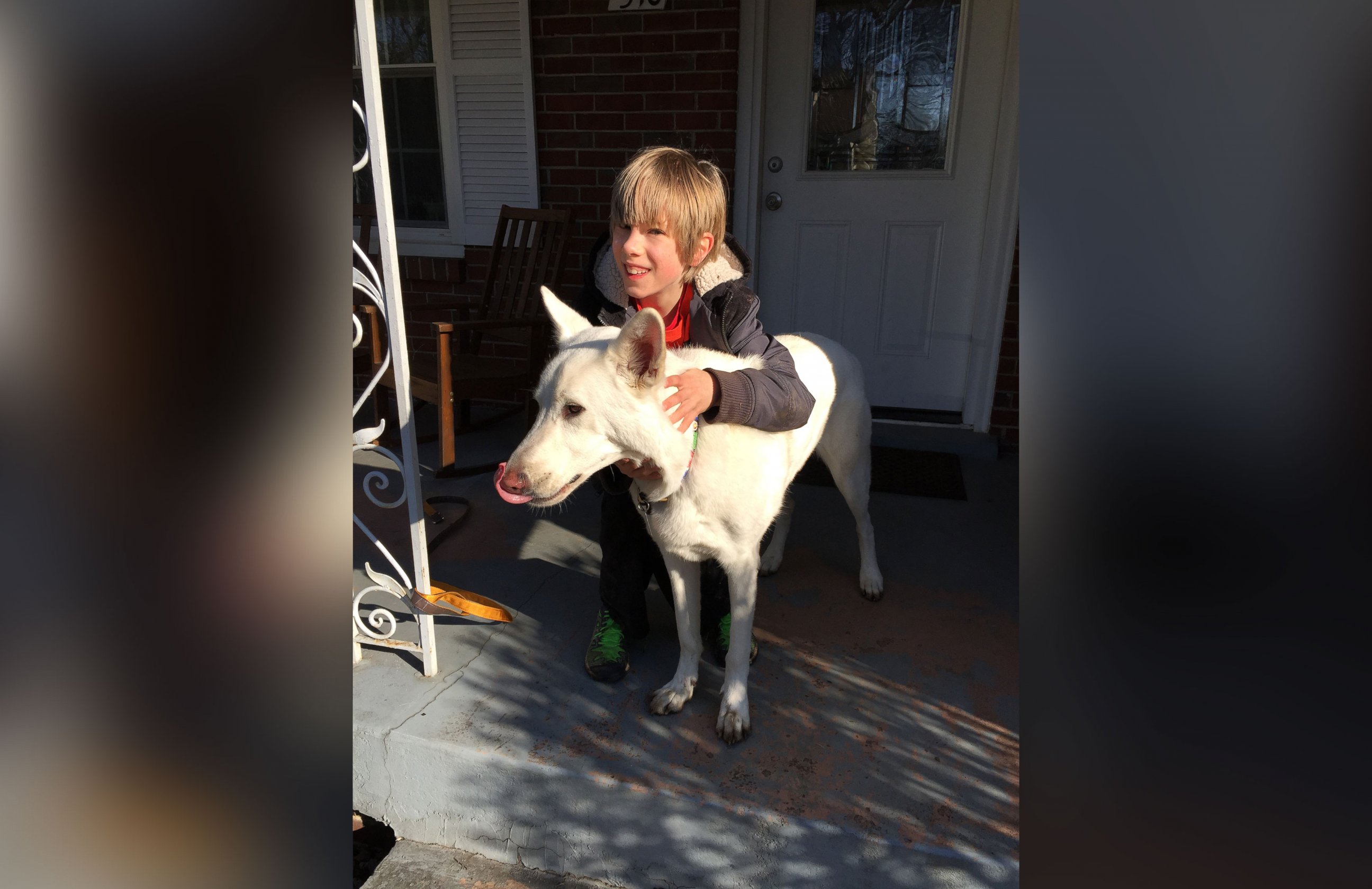PHOTO: Lennox Goebel, 11, was overcome with tears as he was surprised with the return of his neighbor's dog, Bogart, after spending a year in California. 