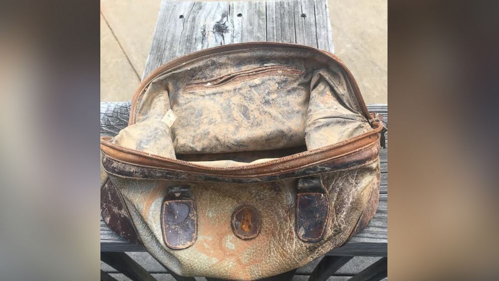 Woman s purse lost in lake found by boy while fishing 25 years